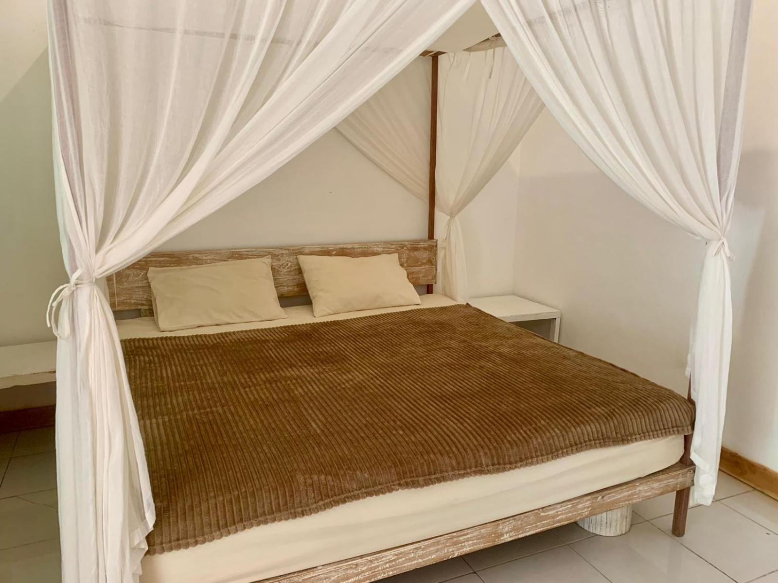 The Village Rua Beach Homestay Экстерьер фото